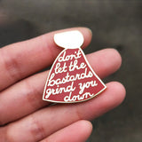 The Handmaid's Tale "Don't Let The Bastards Grind You Down" Enamel Pin