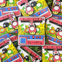 Super Mario Moving Crane Game Hard Enamel Pin