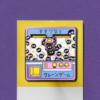 Soot Sprites Moving Crane Game Hard Enamel Pin